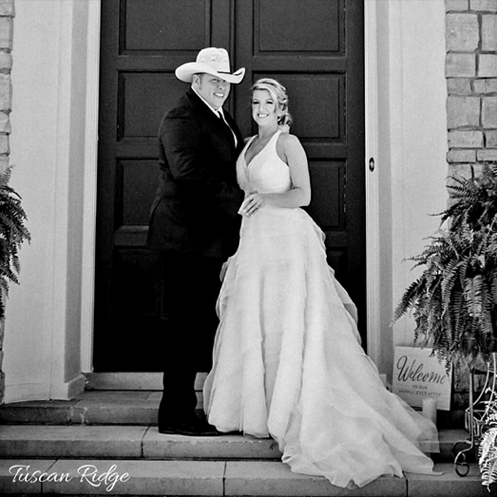 Black and white photo f bride and groom Tuscan Rodge doorway