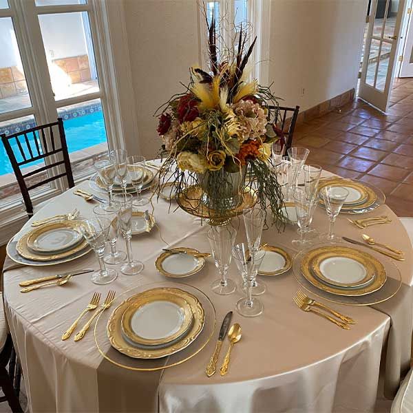 Dining table prepared for guests at Tuscan Ridge.